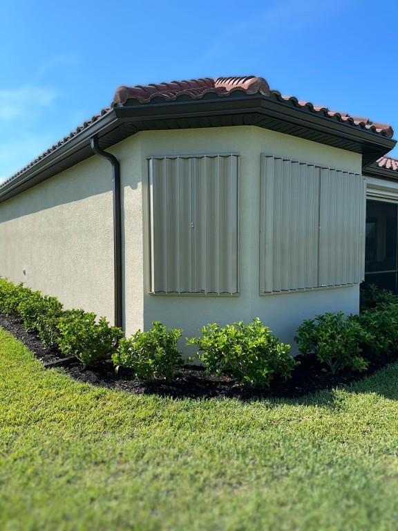 Shutters And Storm Catcher Screens