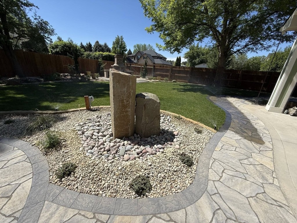 Complete Landscape Redesign with Pavers, Fireplace & Water Feature