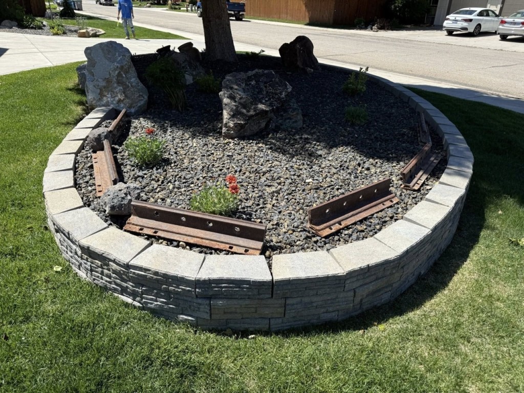 Complete Landscape Redesign with Pavers, Fireplace & Water Feature