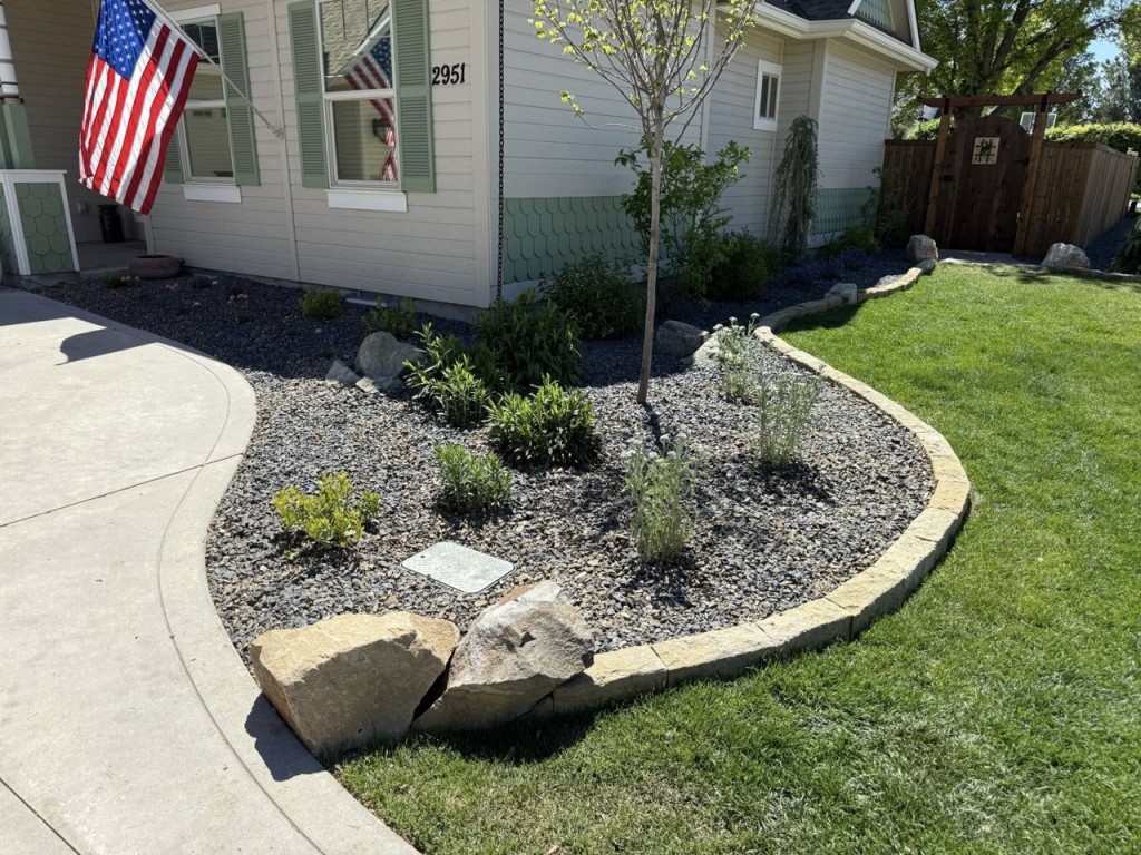 Complete Landscape Redesign with Pavers, Fireplace & Water Feature