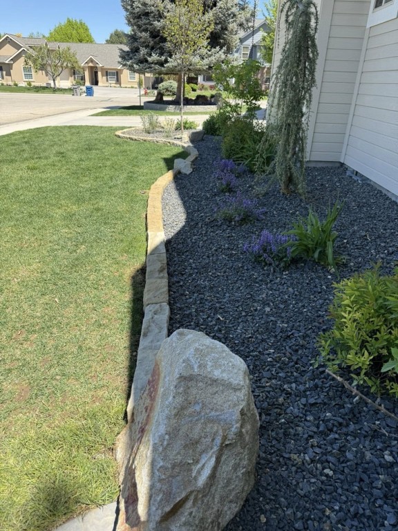 Complete Landscape Redesign with Pavers, Fireplace & Water Feature