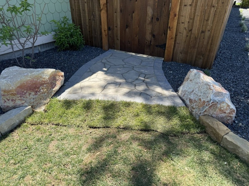 Complete Landscape Redesign with Pavers, Fireplace & Water Feature