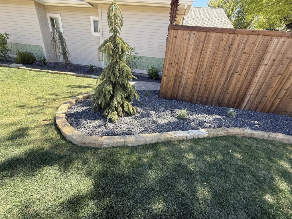 Complete Landscape Redesign with Pavers, Fireplace & Water Feature
