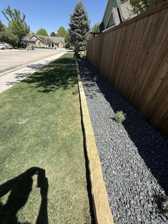 Complete Landscape Redesign with Pavers, Fireplace & Water Feature