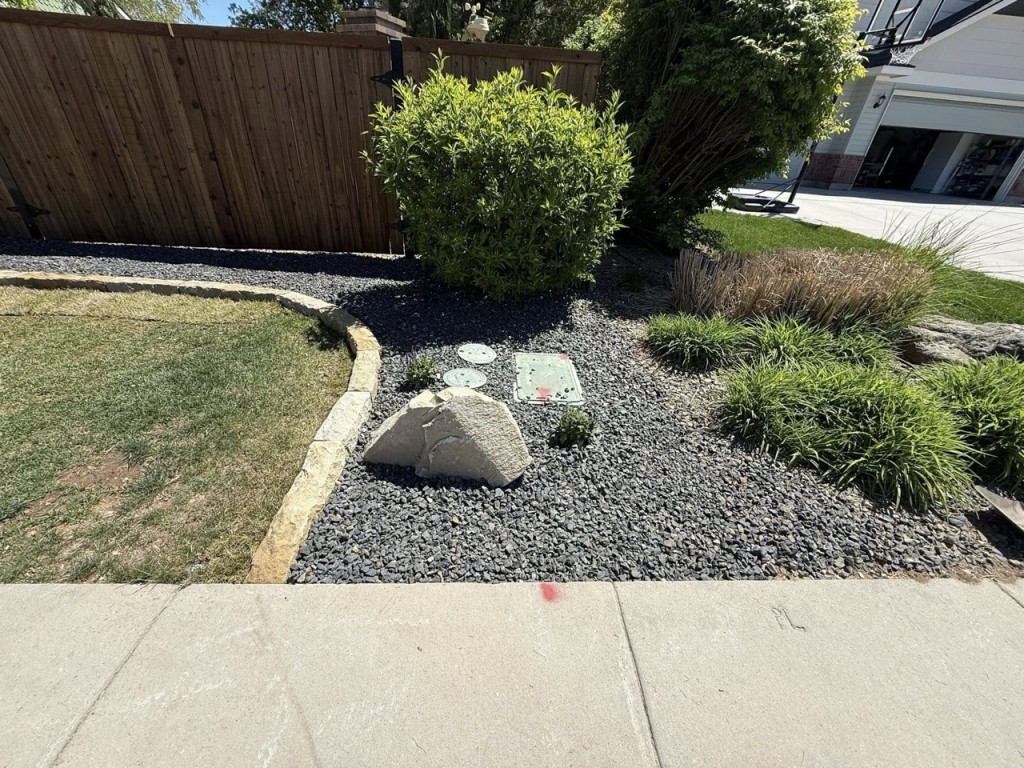 Complete Landscape Redesign with Pavers, Fireplace & Water Feature