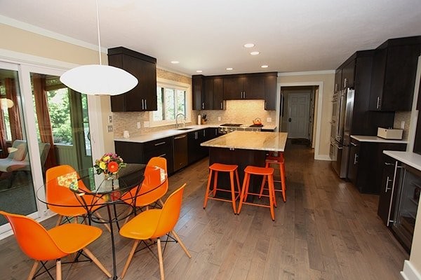 Dark Kitchen with Orange Pop of Color
